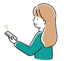 リモコン操作する女性